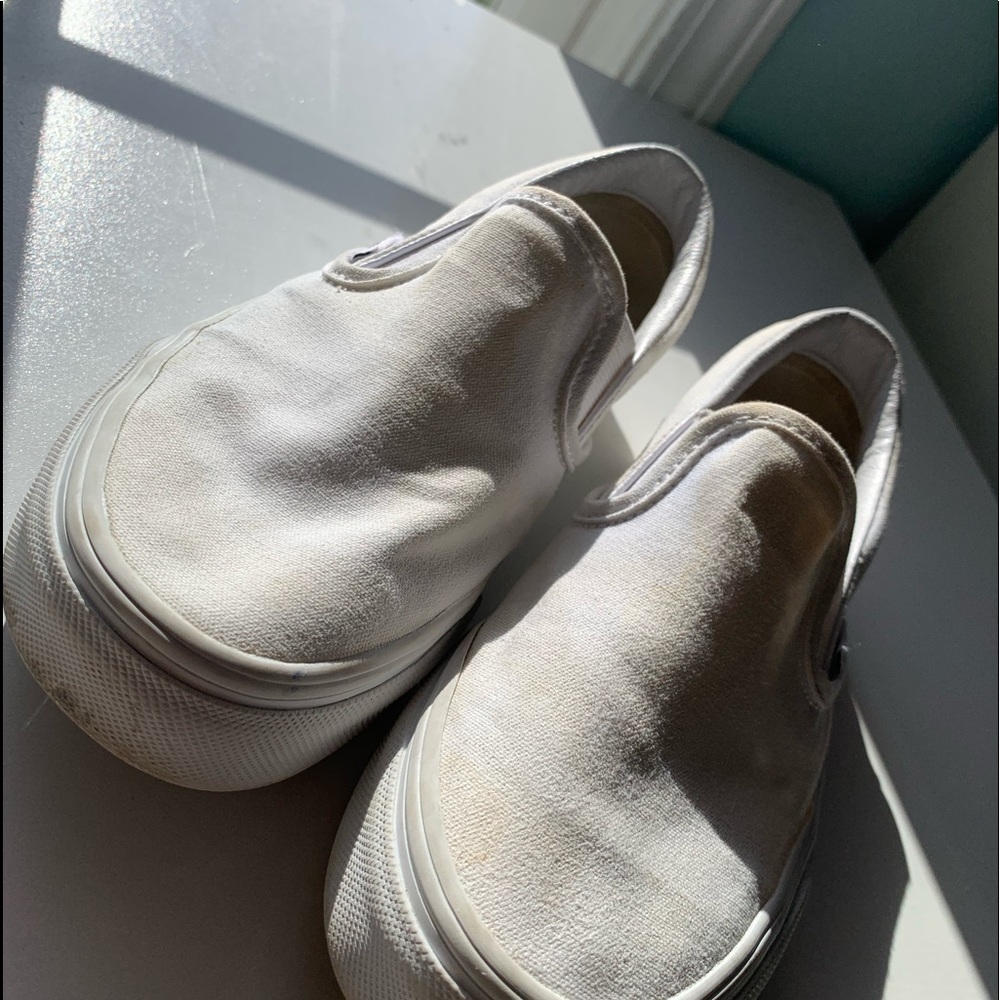 White slip on vans.